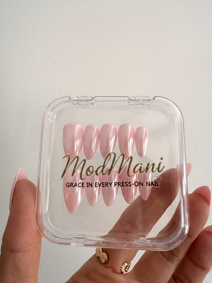 Aurora Pink pearly pink medium almond press on nails in ModMani case