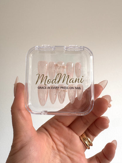 Blushing Bow pink 3D bow press-on nails in ModMani clear case
