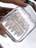 Close-up of Blushing Bow 3D bow ribbon and pearl press-on nail design