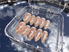 Glazed Dotty nude polka dot short almond press on nails