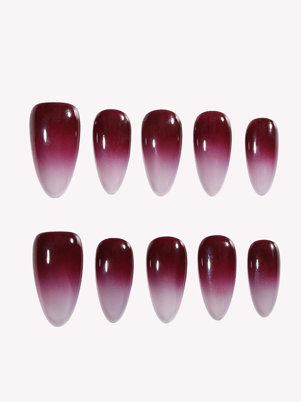 Close-up of Cherry Mocha glossy ombre Medium Almond press-on nail